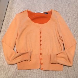 Cardigan sweater, scoop neckline.